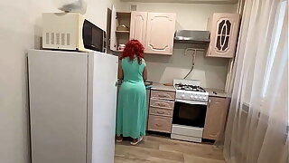 Mom with a big ass satisfied her son with her anal in the kitchen